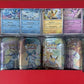Pokemon TCG: Scarlet & Violet: Prismatic Evolutions Mini Tin with Promo Cards (All 8 Tins) - 2 Packs Per Tin
