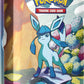 Pokemon TCG: Scarlet & Violet —Prismatic Evolutions Mini Tin - Glaceon (2 Booster Packs & 1 Coin)